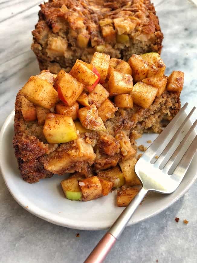 slice of healthy apple cinnamon bread with apples on top