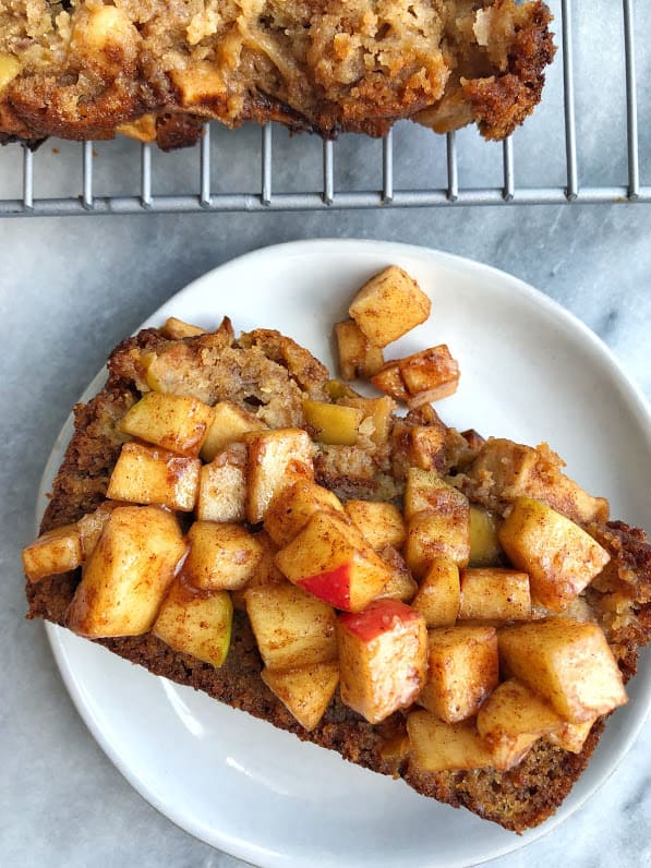 slice of healthy apple cinnamon bread with apples on top