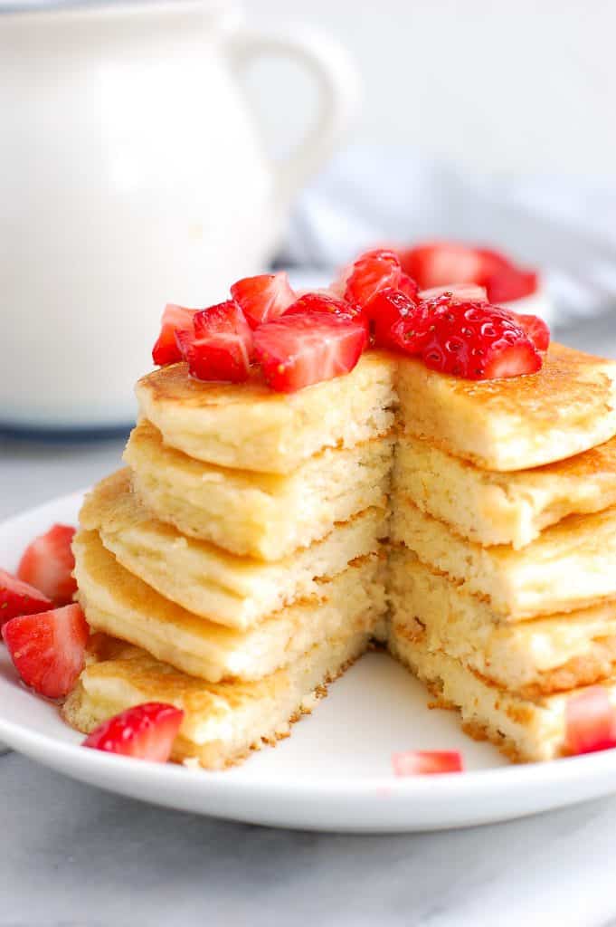stack of paleo pancakes with slice