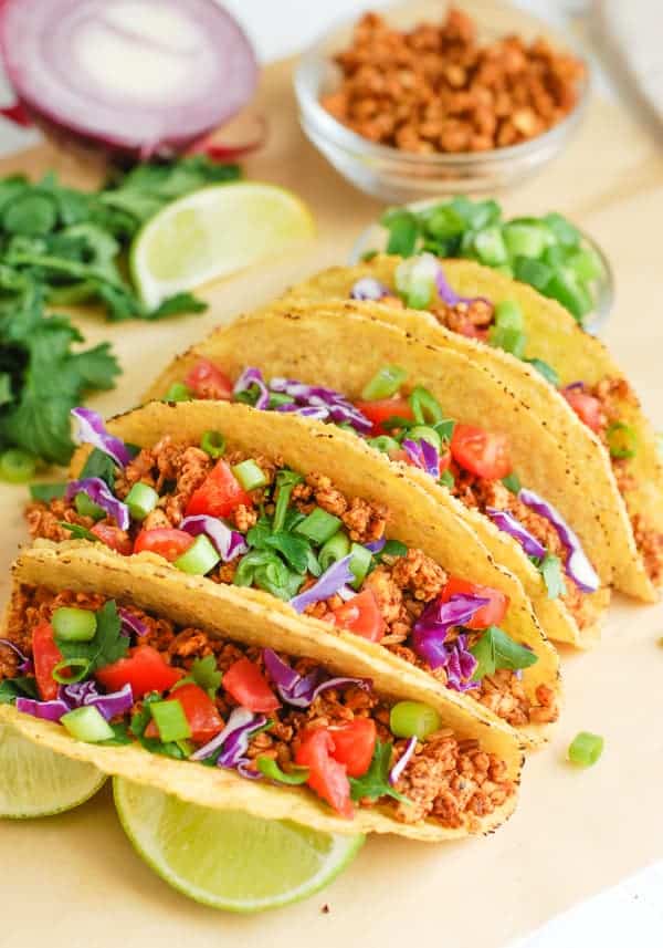 tacos stacked in a row