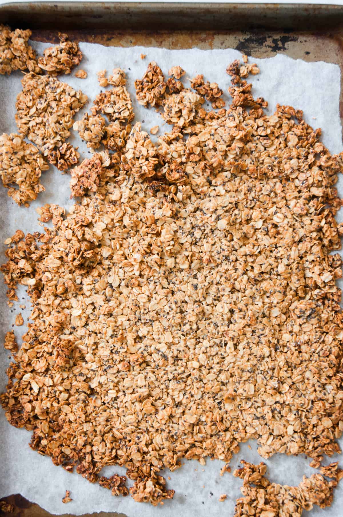 almond butter granola on sheet