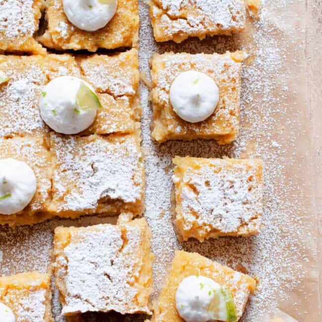 tray of healthier key lime pie bars with powdered sugar
