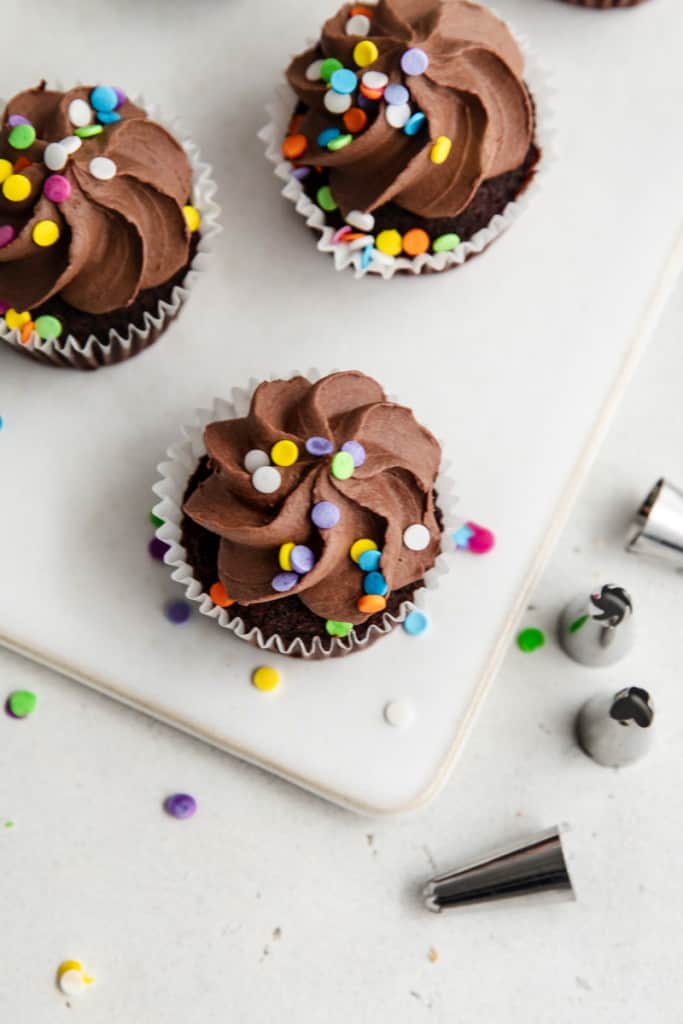 homemade chocolate frosting on cupcakes