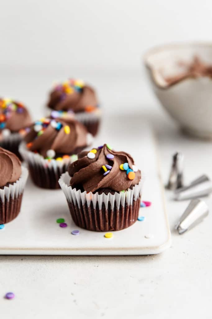 homemade chocolate frosting on cupcakes