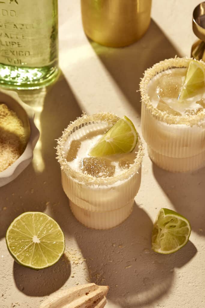 coconut margarita in glass with lime
