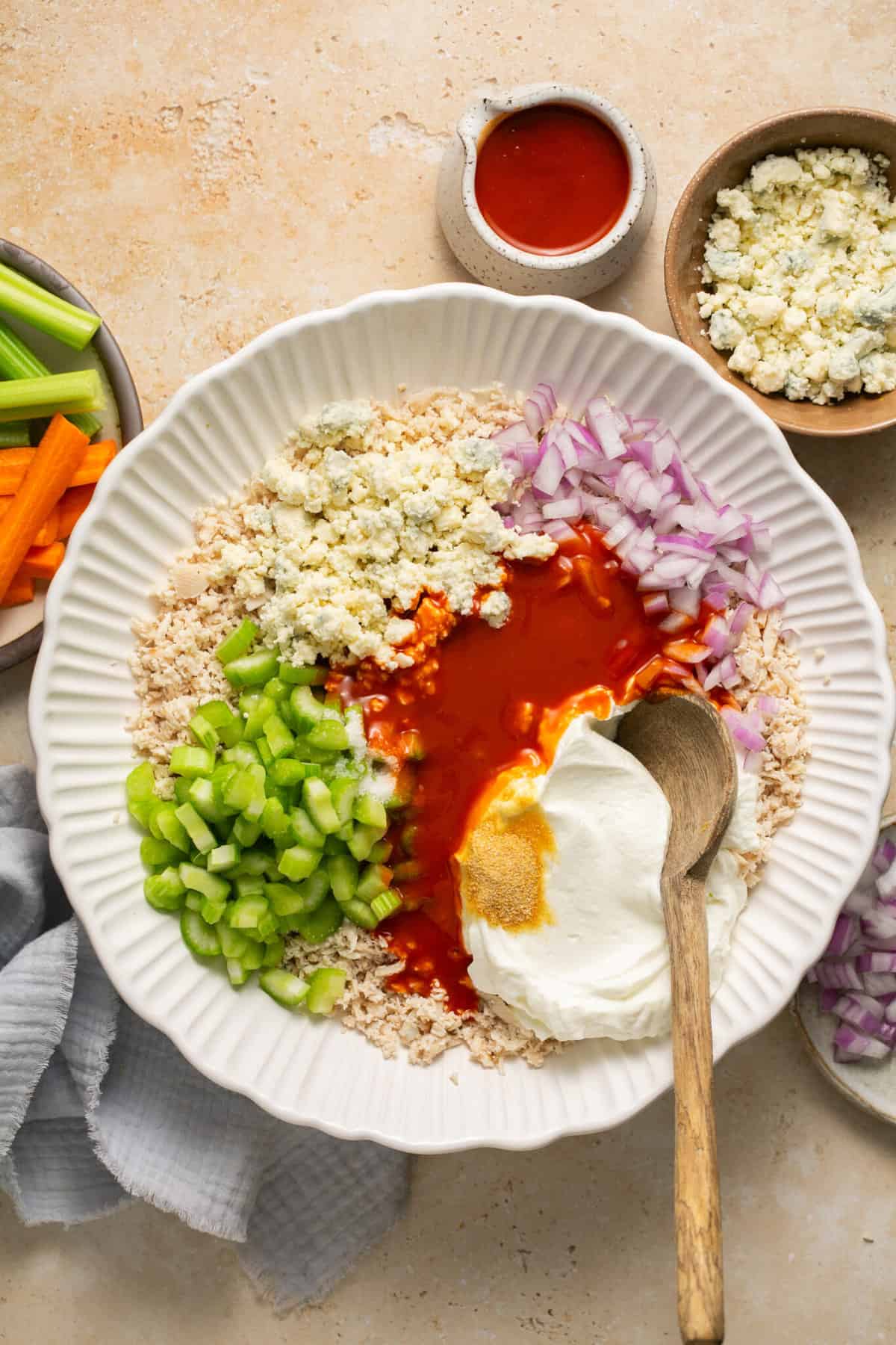ingredients for buffalo chicken salad in bowl