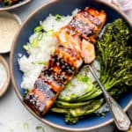 grilled terriyaki salmon in bowl with fork
