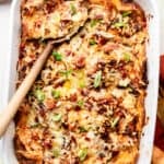 croissant breakfast casserole baked with wooden spoon