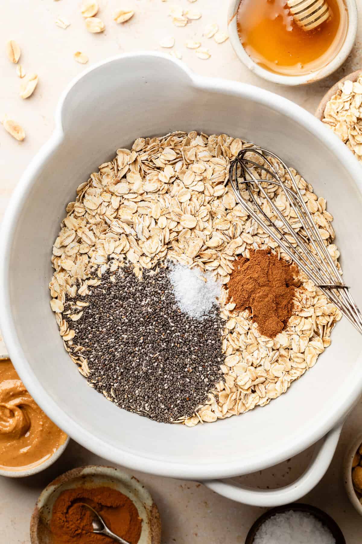 dry ingredients in white bowl with whisk