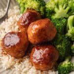 Hot Honey Meatballs on plate with broccoli and rice
