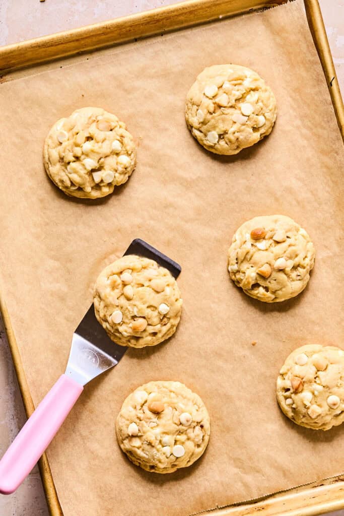 White Chocolate Macadamia Nut Cookies on baking sheet