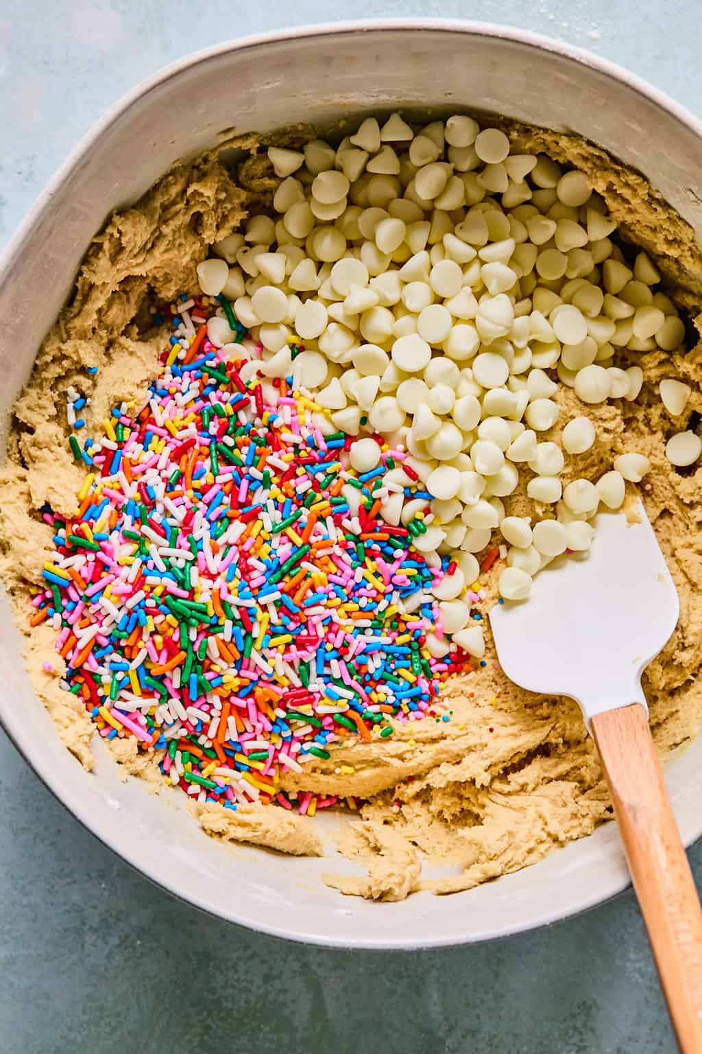 Chocolate chips and sprinkles added to dough