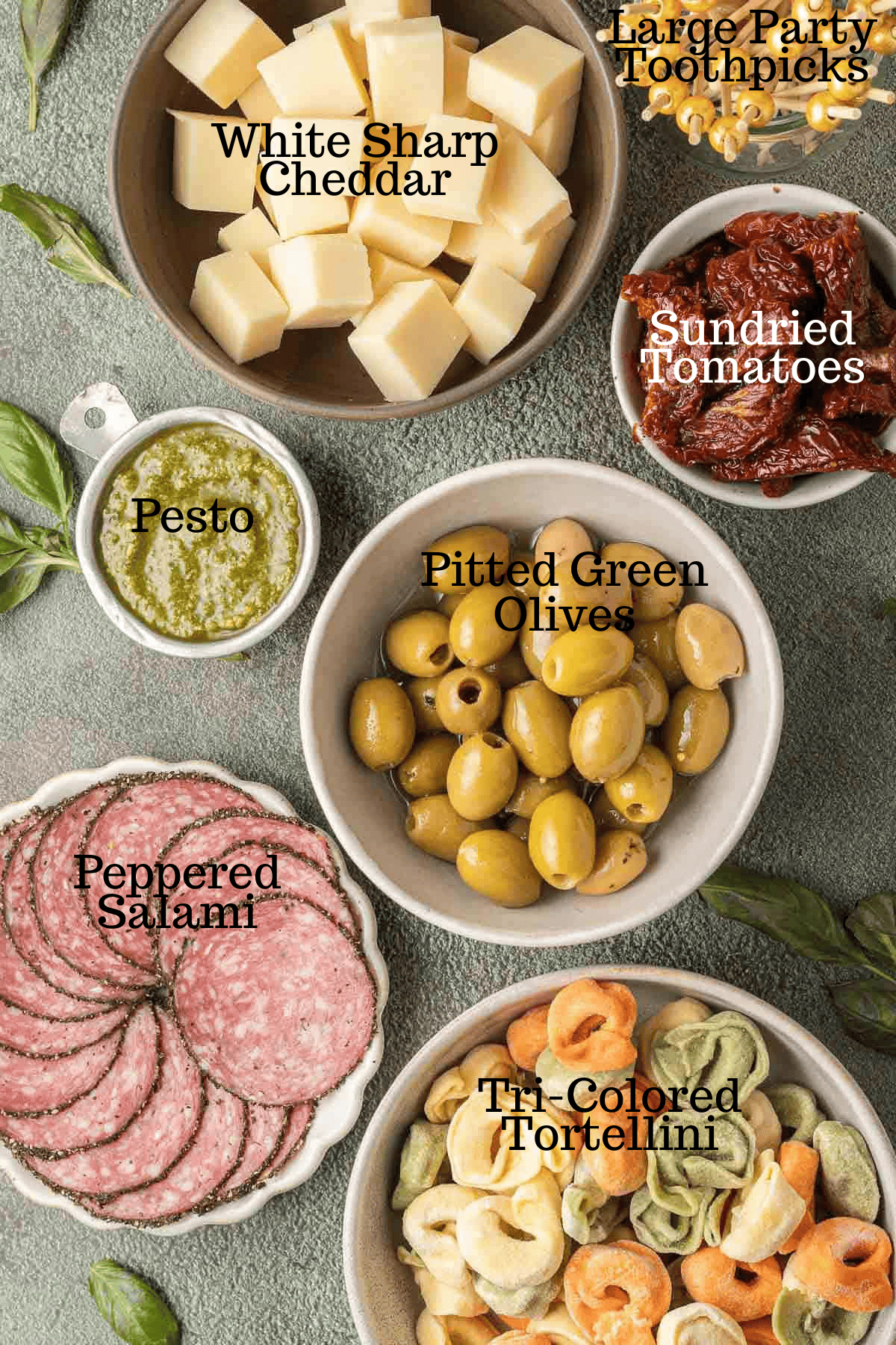 Photo of ingredients for Pesto Tortellini Bites with labels.