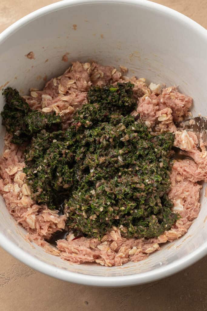 ground turkey and herbs in bowl