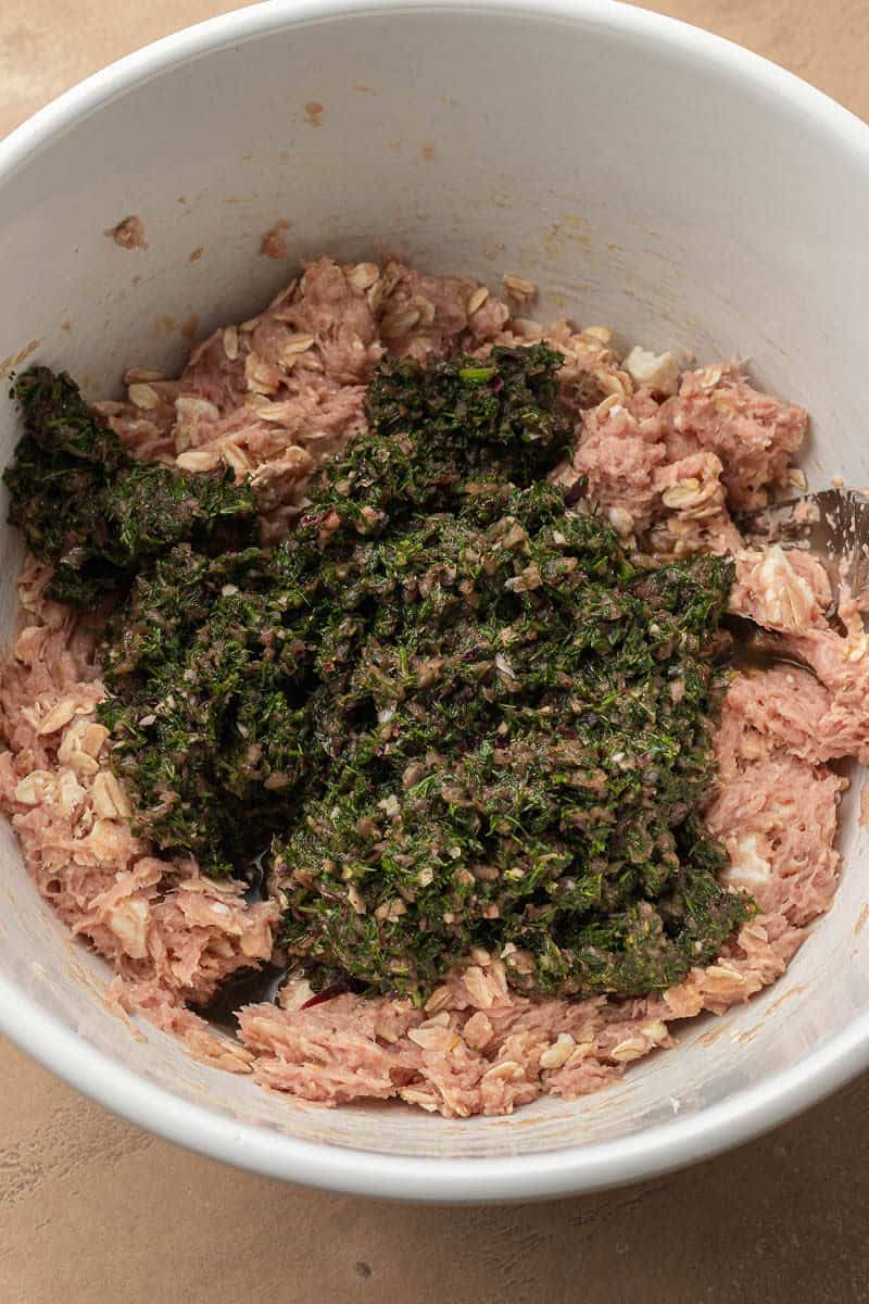 ground turkey and herbs in bowl