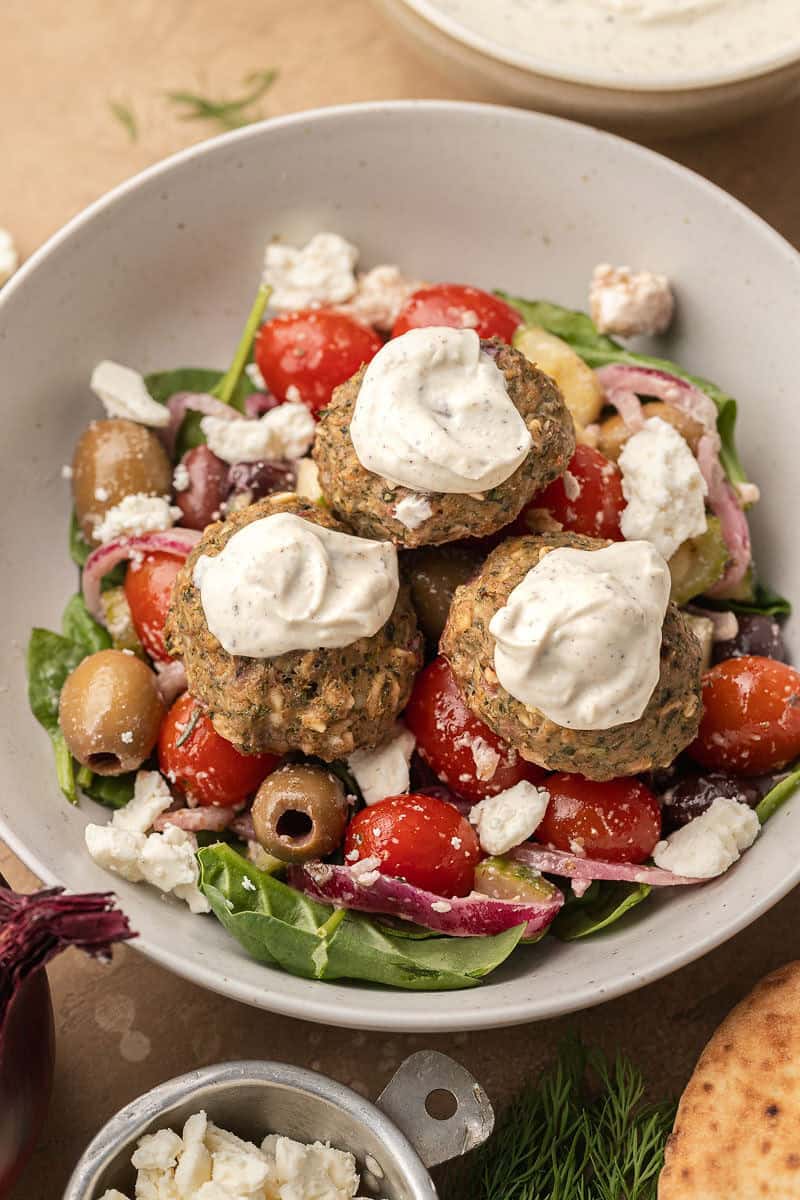 lemon dill meatballs over greek salad