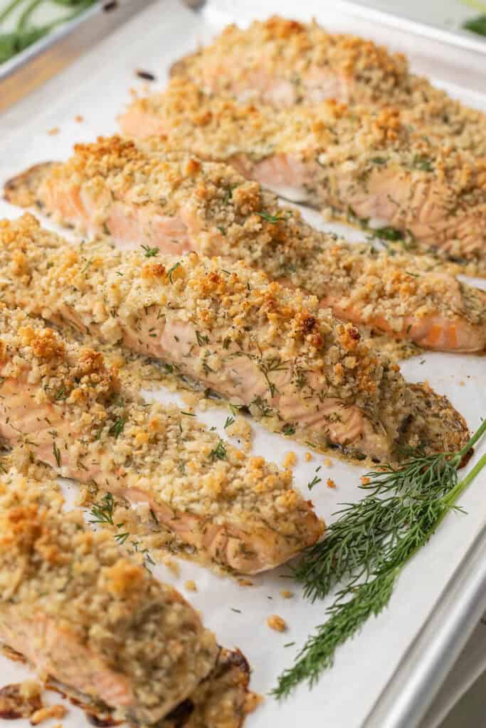 baked salmon covered in breadcrumbs and herbs