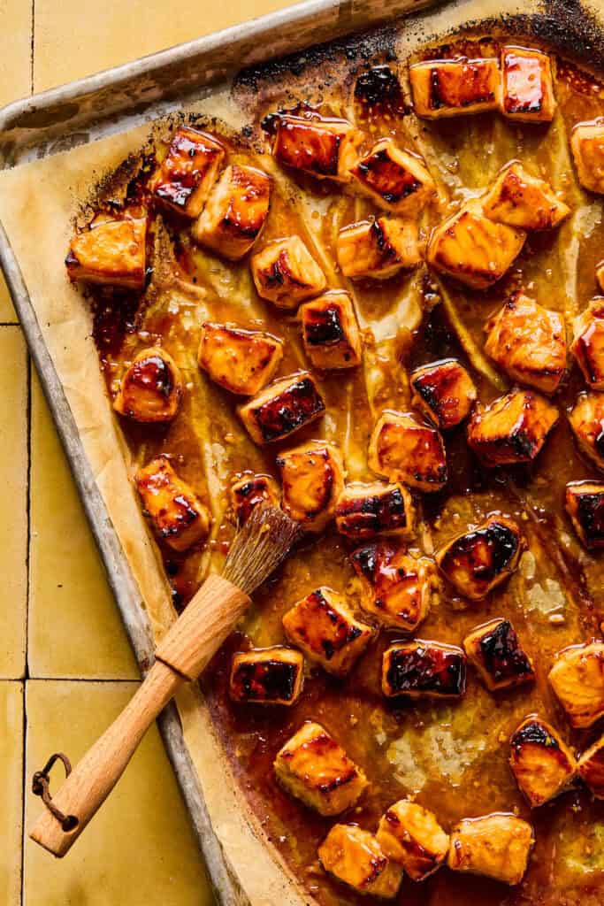 salmon baked on baking sheet