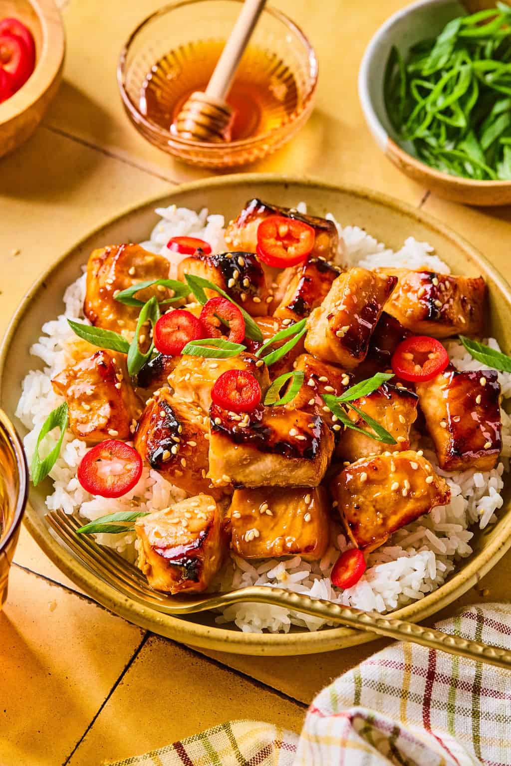 Honey Glazed Salmon Bites on rice in bowls