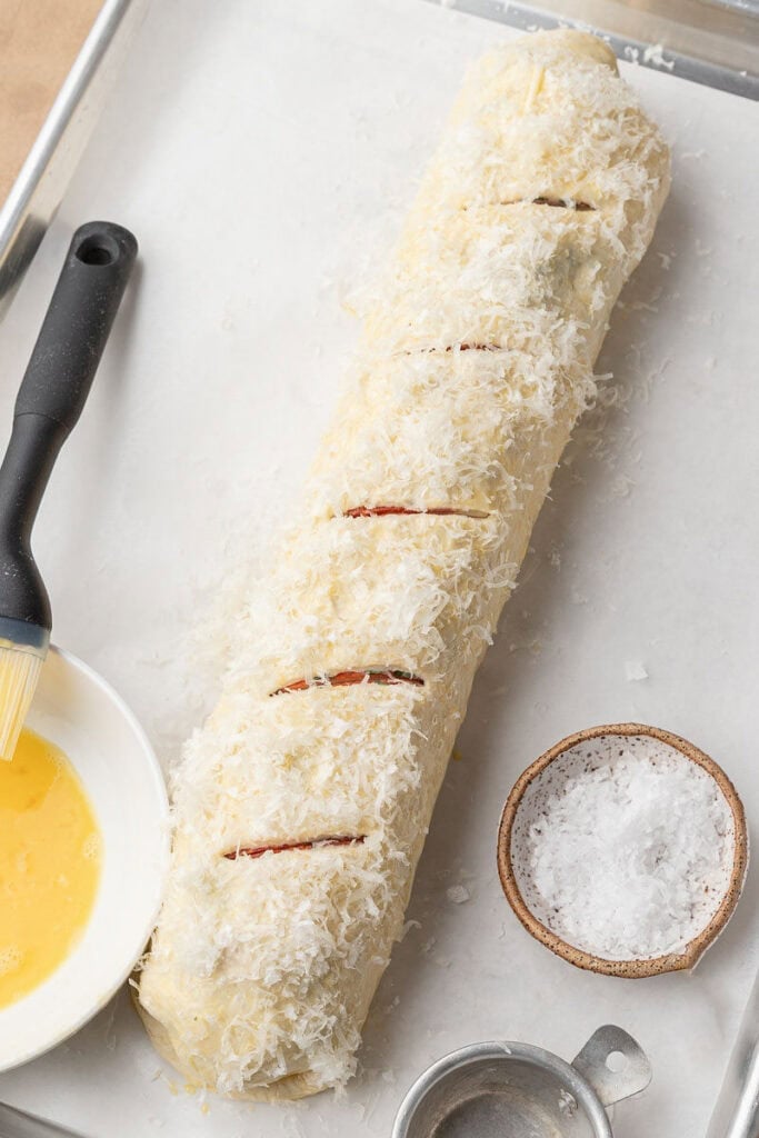 Stromboli rolled on parchment paper