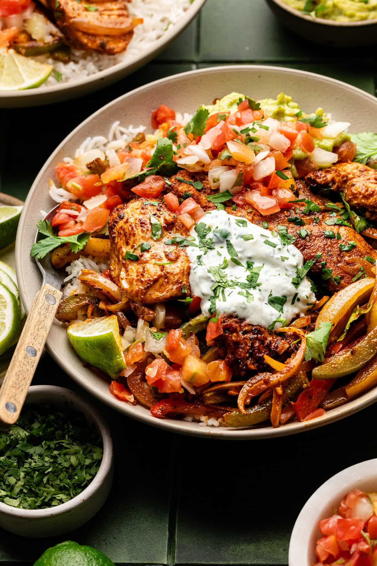 chicken fajitas in bowl served over rice