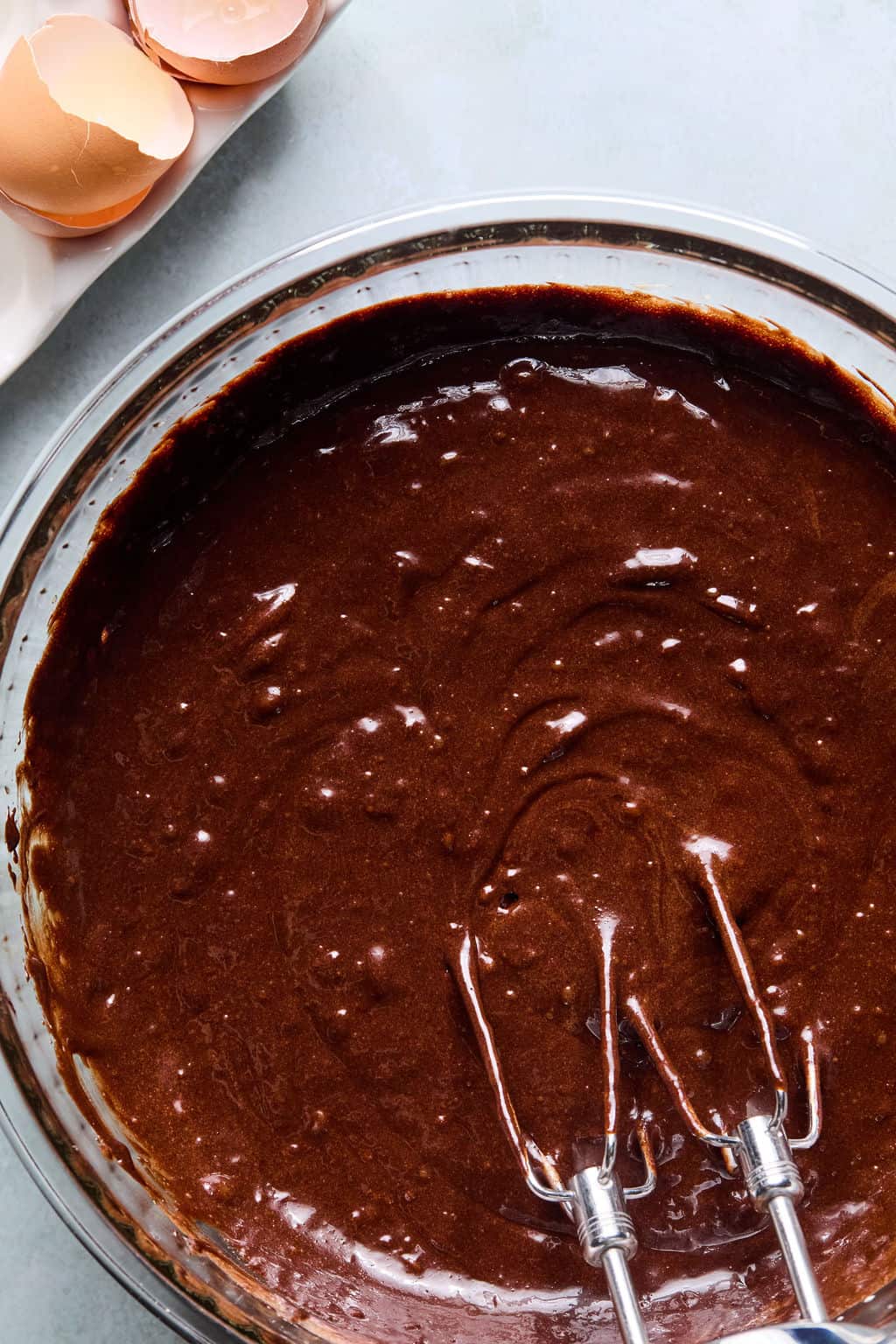 Brownie batter in glass bowl.