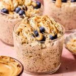 Glass containers with Peanut Butter Overnight Oats.