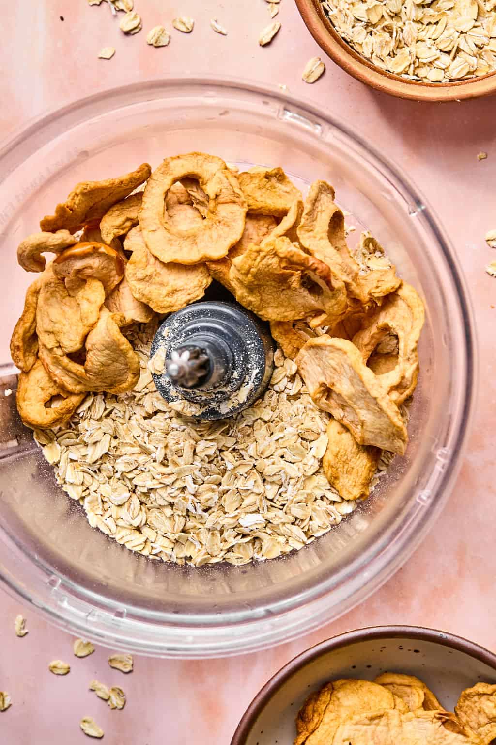 Dried apples and oats in food processor.