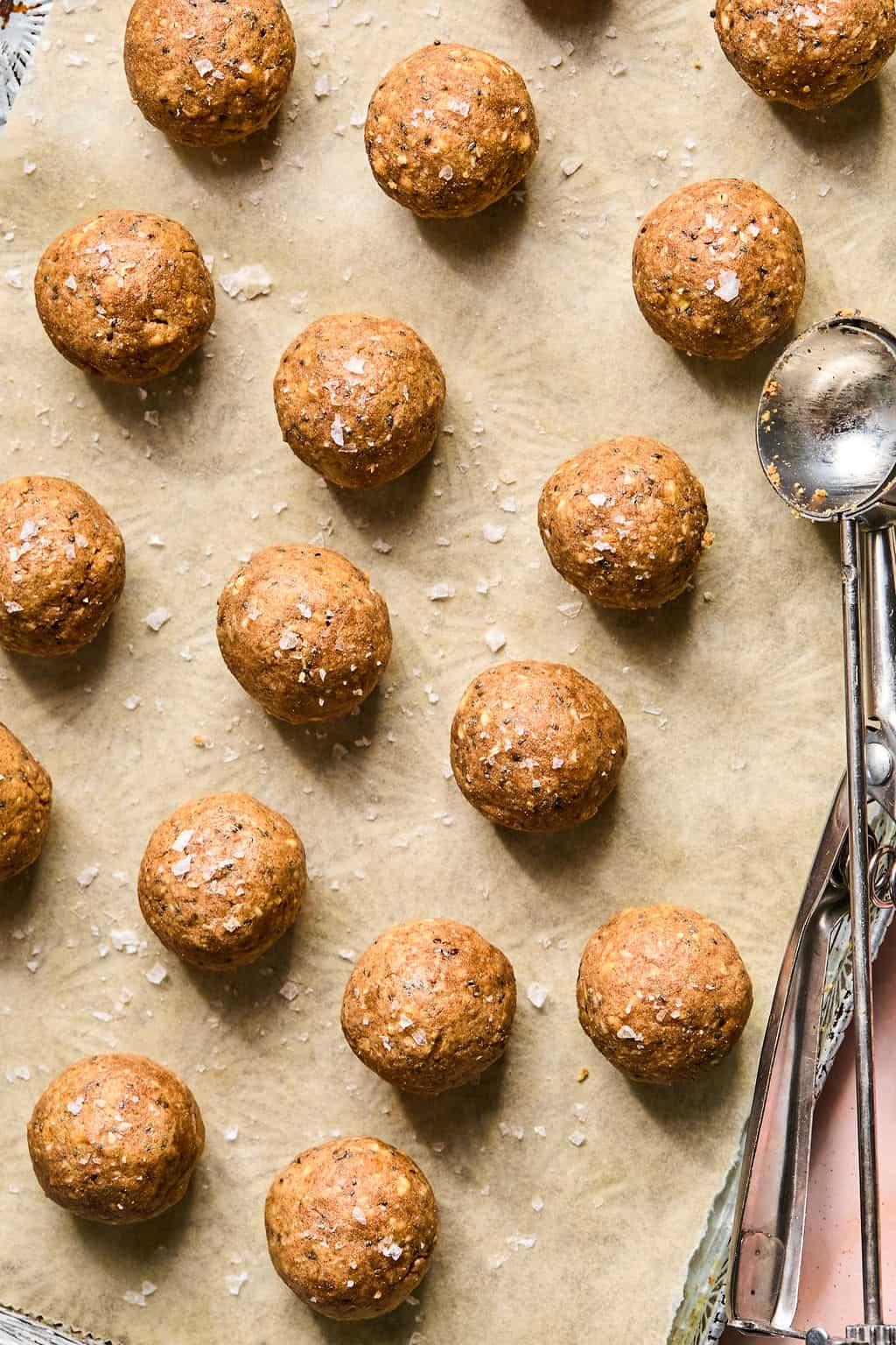 Apple pie balls on sheet.