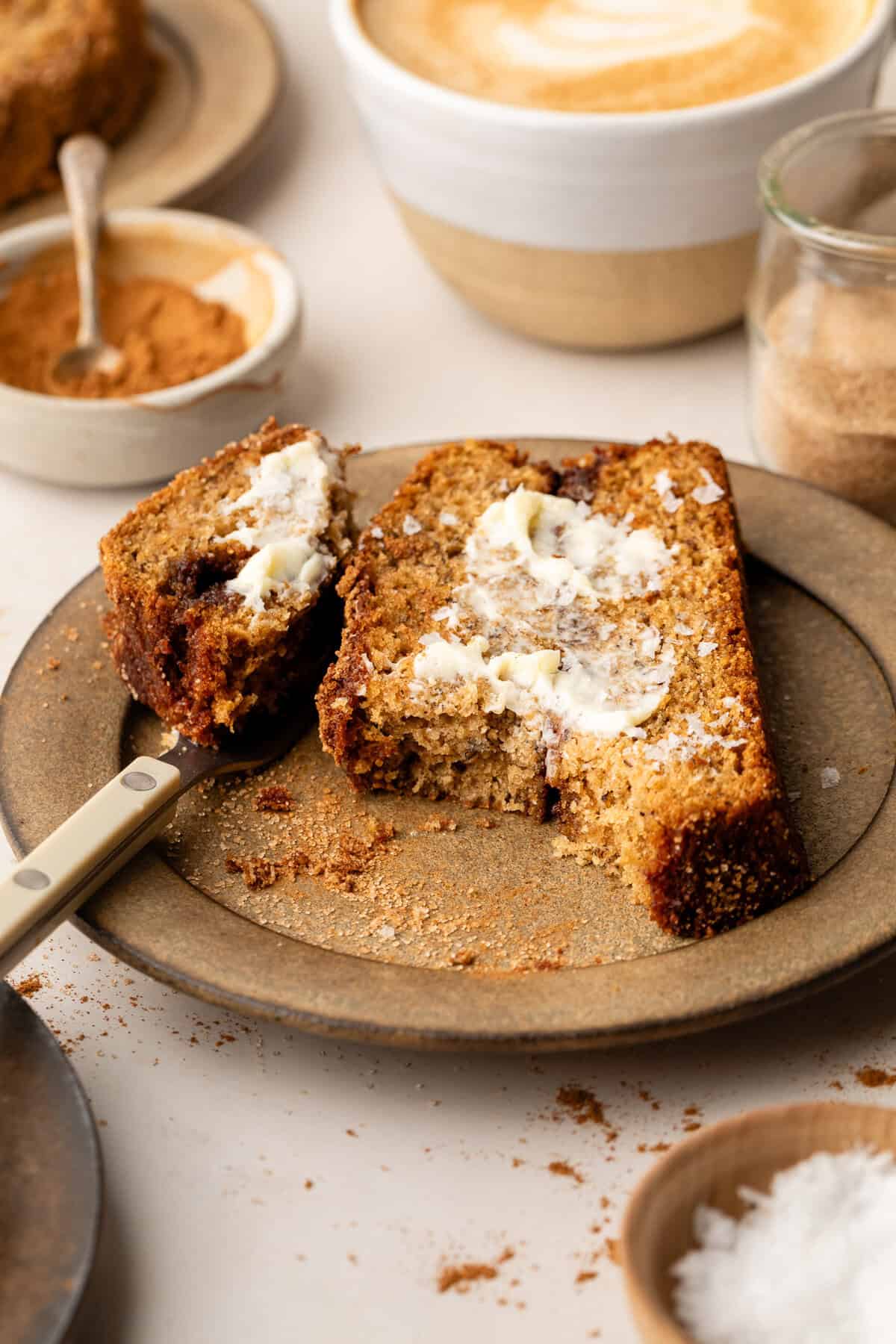 Brown Butter Snickerdoodle Banana Bread slice on plate.
