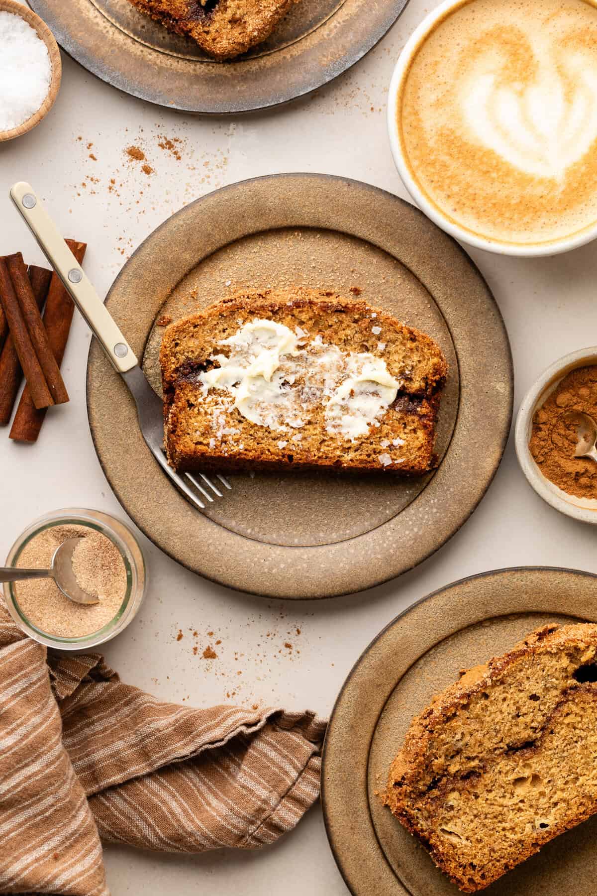 Brown Butter Snickerdoodle Banana Bread slice on plate.