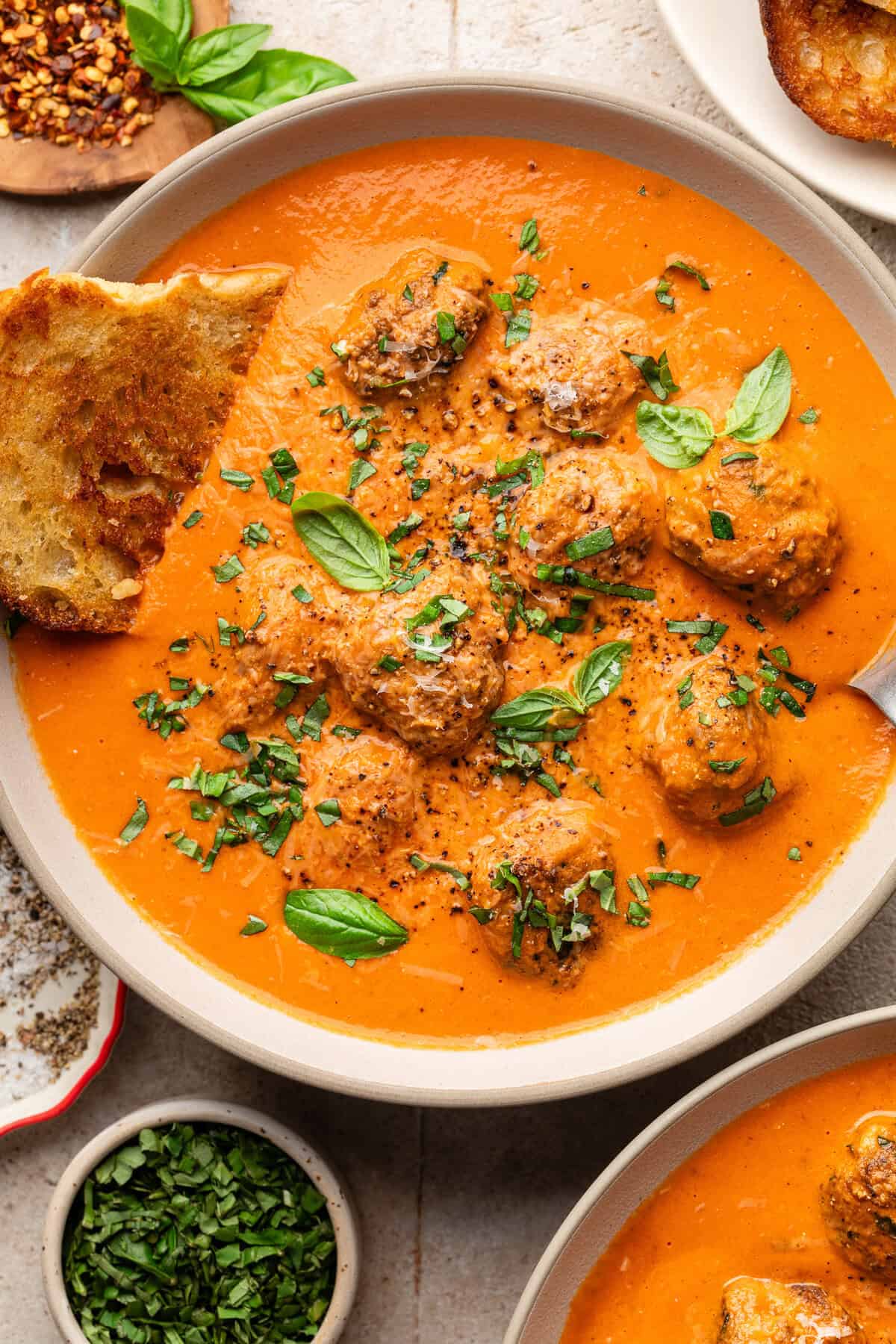 Creamy Tomato Meatball Soup in bowl.