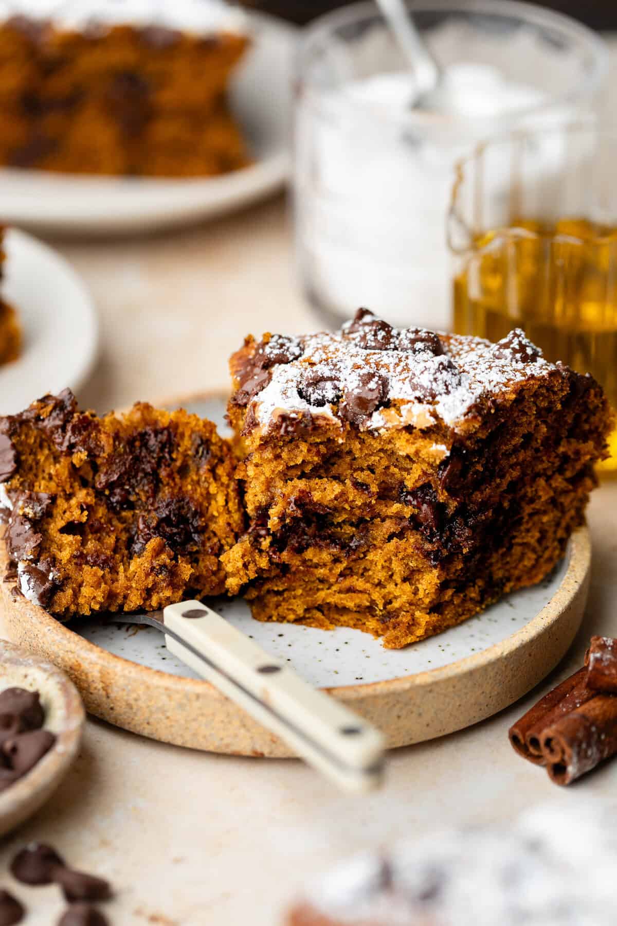 slice of pumpkin olive oil cake on plate with fork